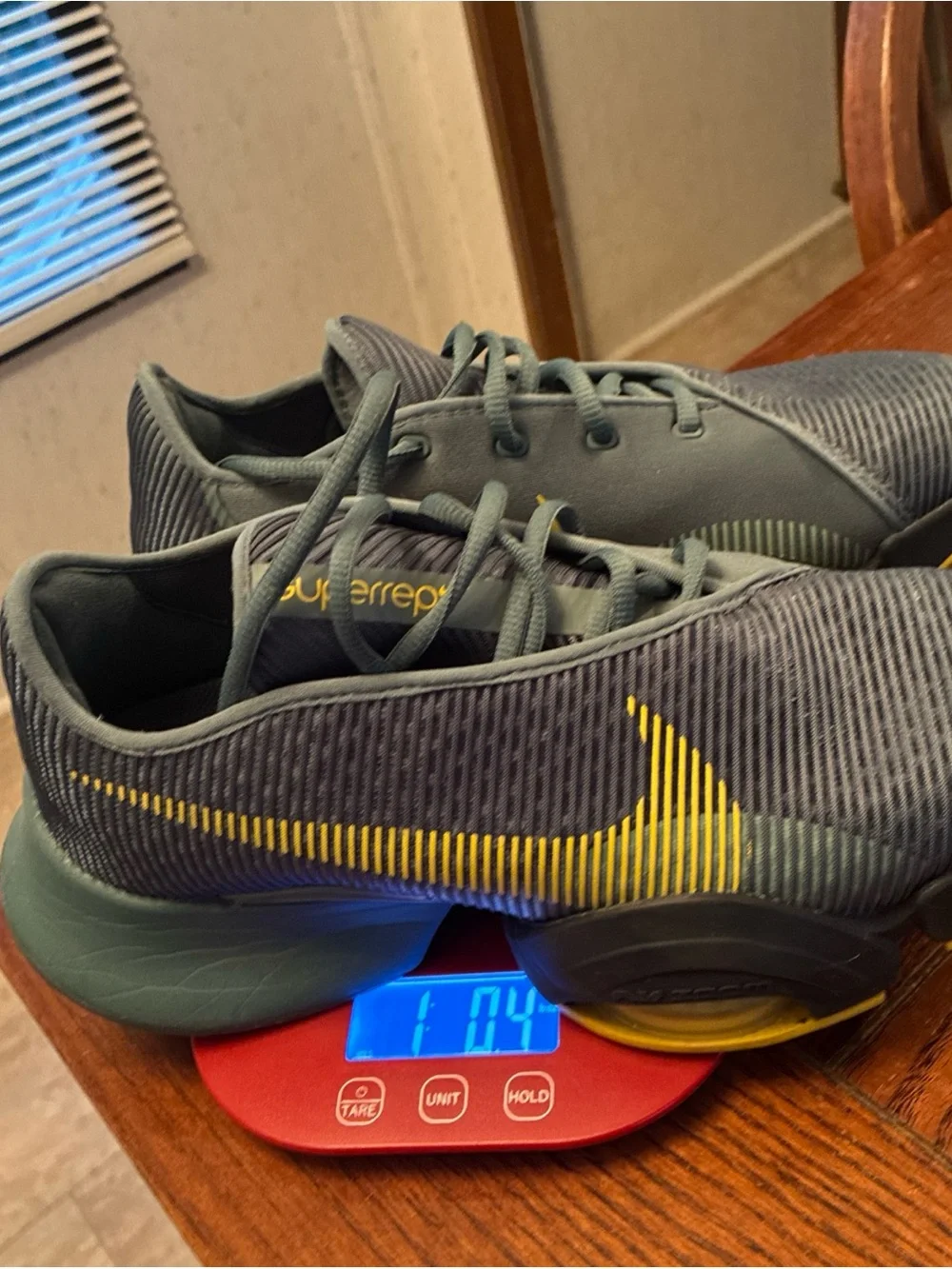 Nike Men’s Gray Athletic Shoes with Yellow Swoosh